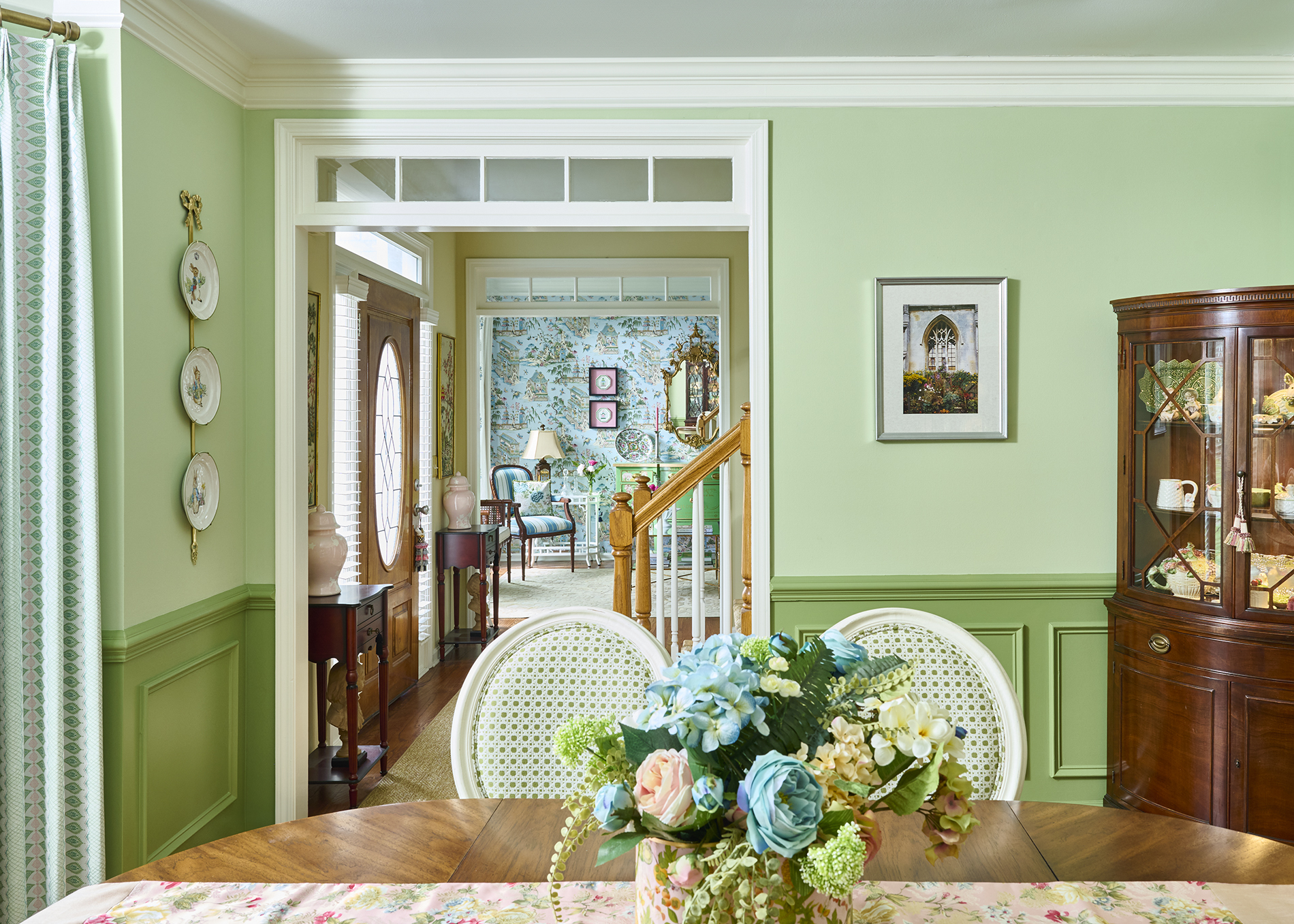 Dining Room — Green wainscoting & floral centerpiece