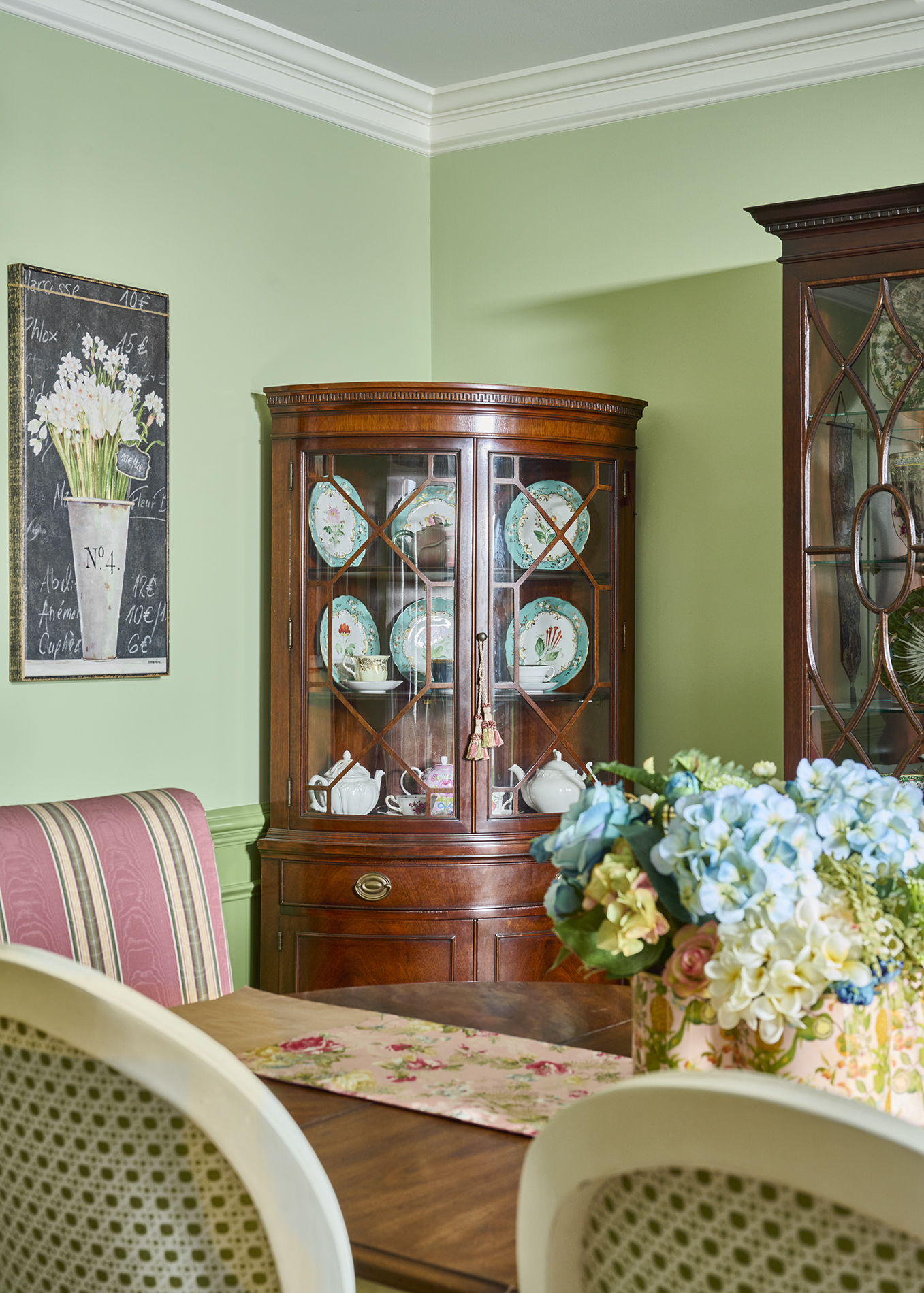 Dining Room Detail — Corner china cabinet & florals