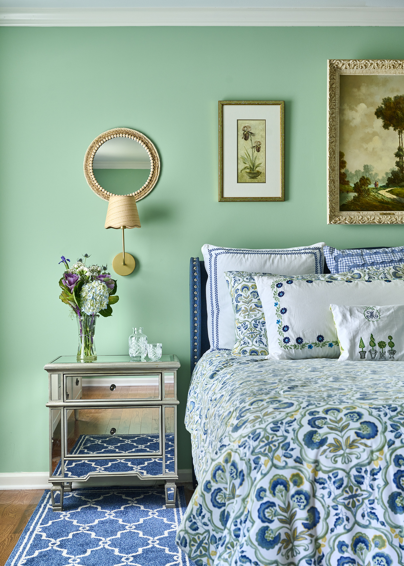 Primary Suite Detail — Mirrored nightstand & layered bedding